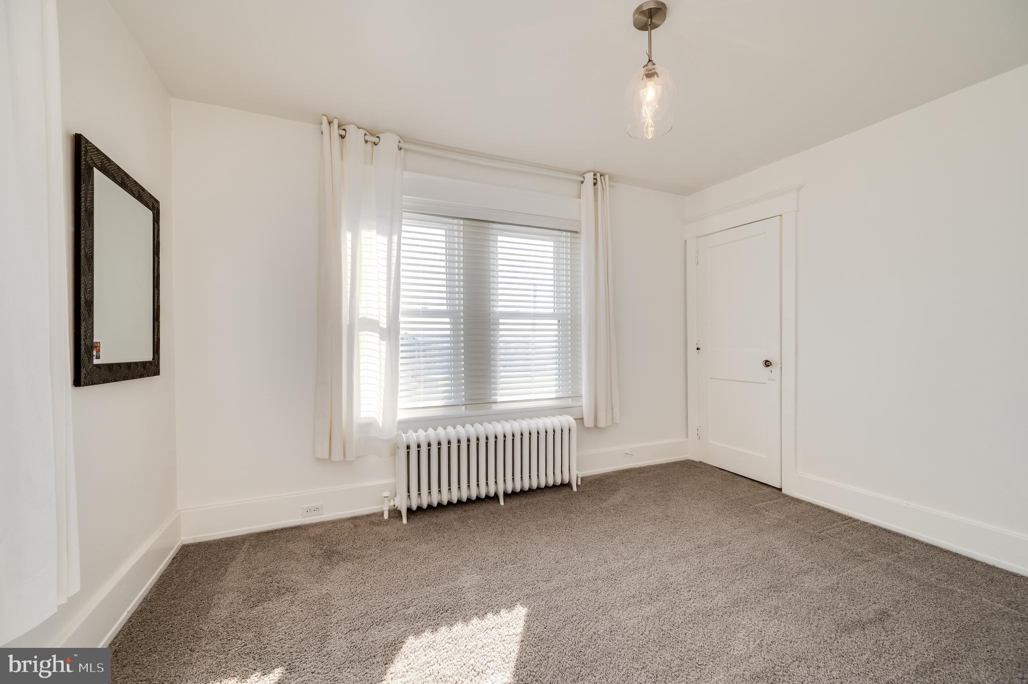 2021 Noble Street Reading, PA 19609 - Photo 27 of 54 a view of an empty room with a window