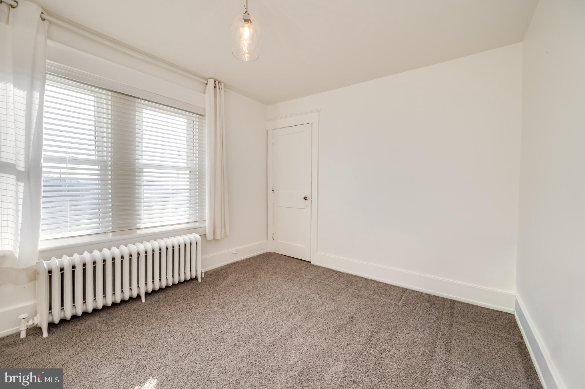 2021 Noble Street Reading, PA 19609 - Photo 28 of 54 an empty room with a window