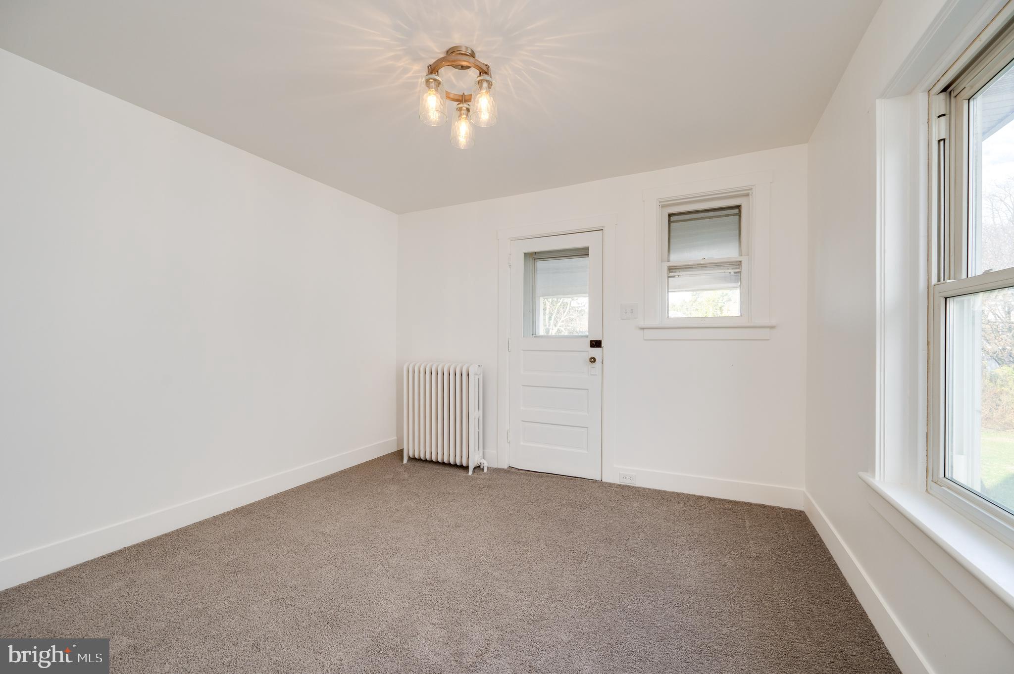 2021 Noble Street Reading, PA 19609 - Photo 29 of 54 a view of empty room with windows