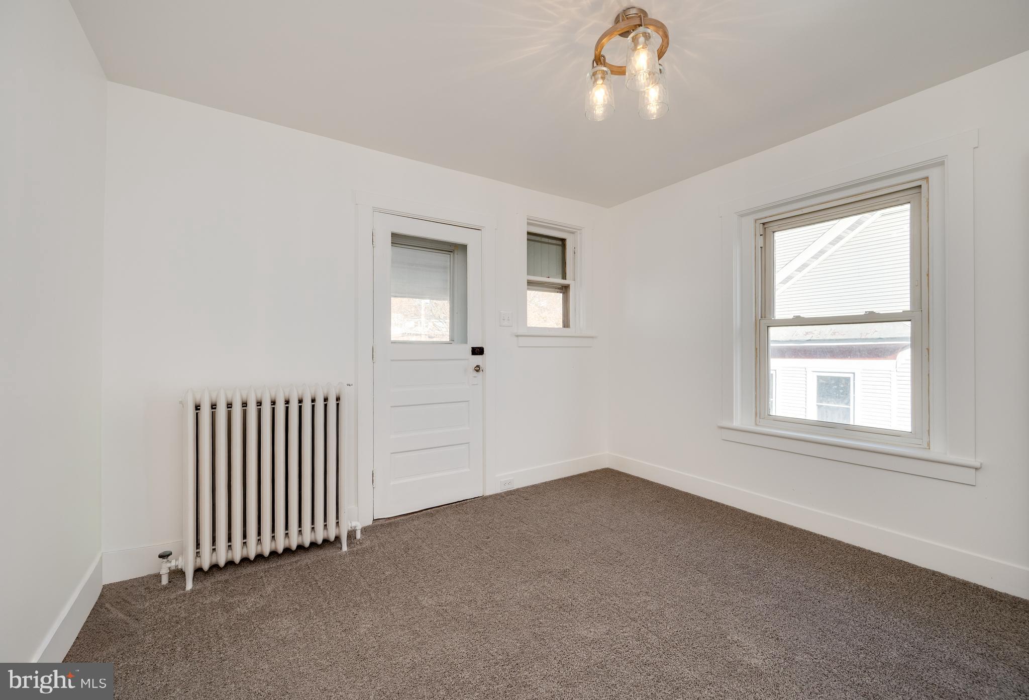 2021 Noble Street Reading, PA 19609 - Photo 30 of 54 an empty room with windows