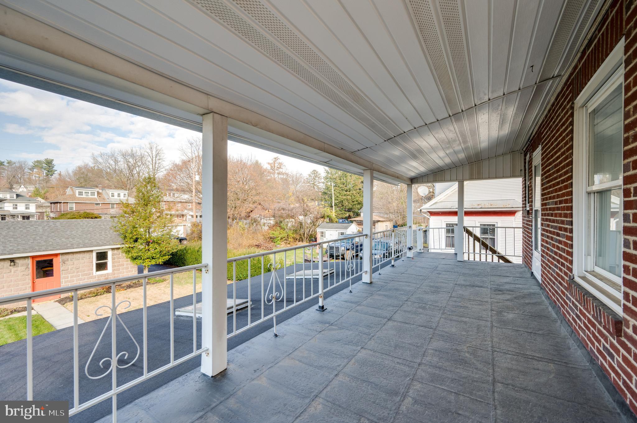 2021 Noble Street Reading, PA 19609 - Photo 33 of 54 a view of a porch with furniture and next to a yard