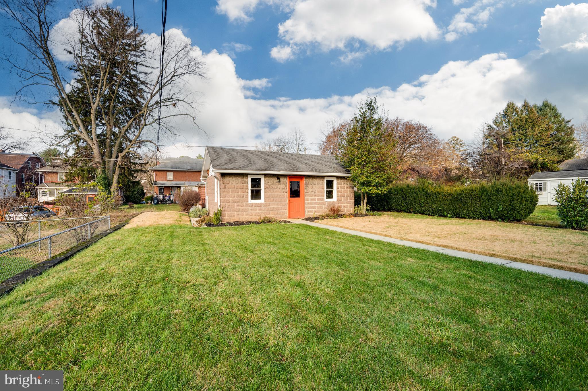 2021 Noble Street Reading, PA 19609 - Photo 43 of 54 a front view of a house with garden