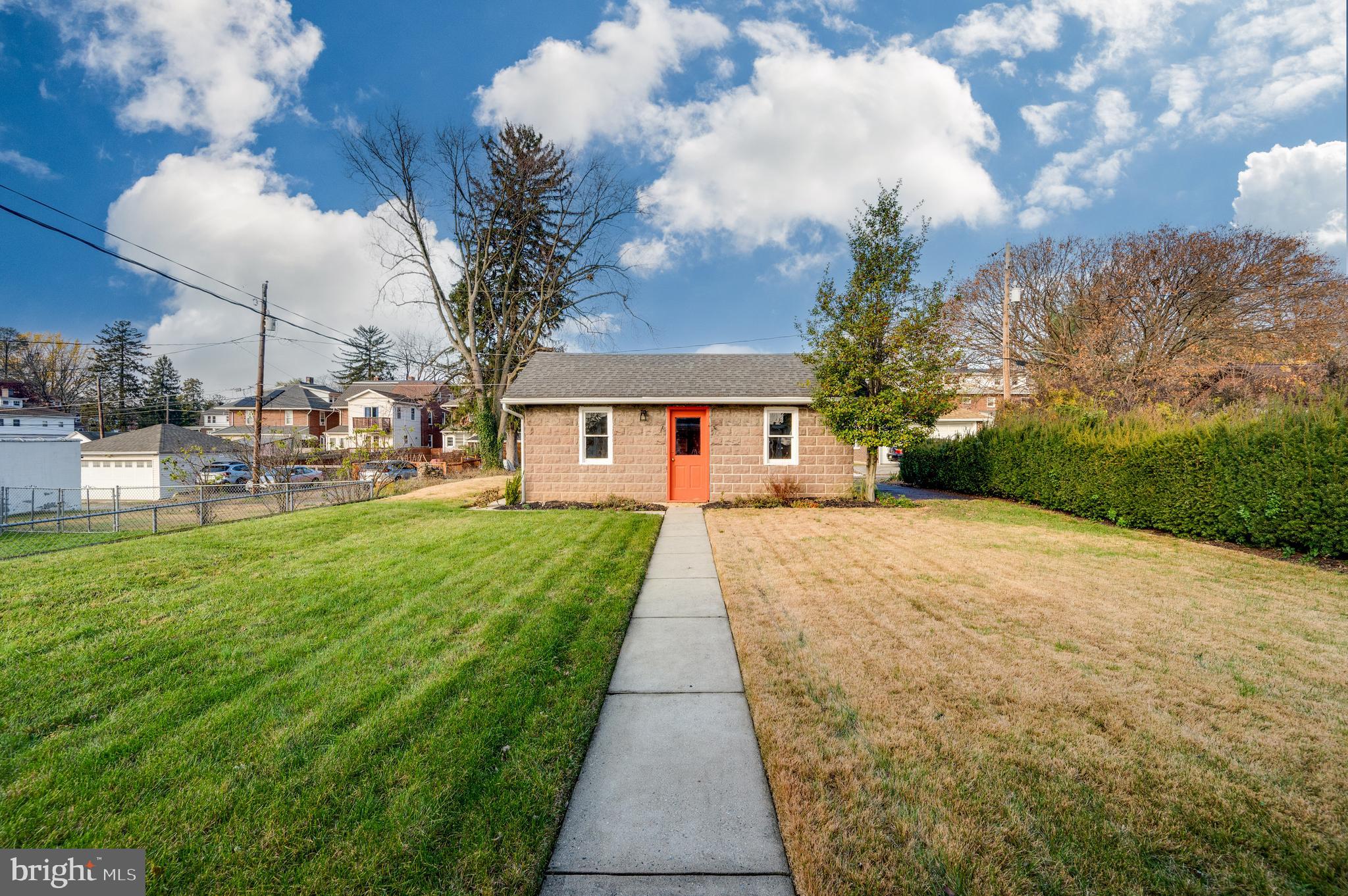 2021 Noble Street Reading, PA 19609 - Photo 44 of 54 a front view of a house with garden