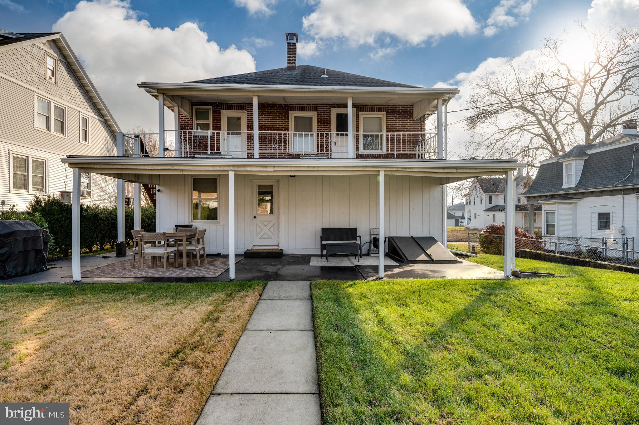 2021 Noble Street Reading, PA 19609 - Photo 48 of 54 a view of a house with swimming pool having outdoor seating