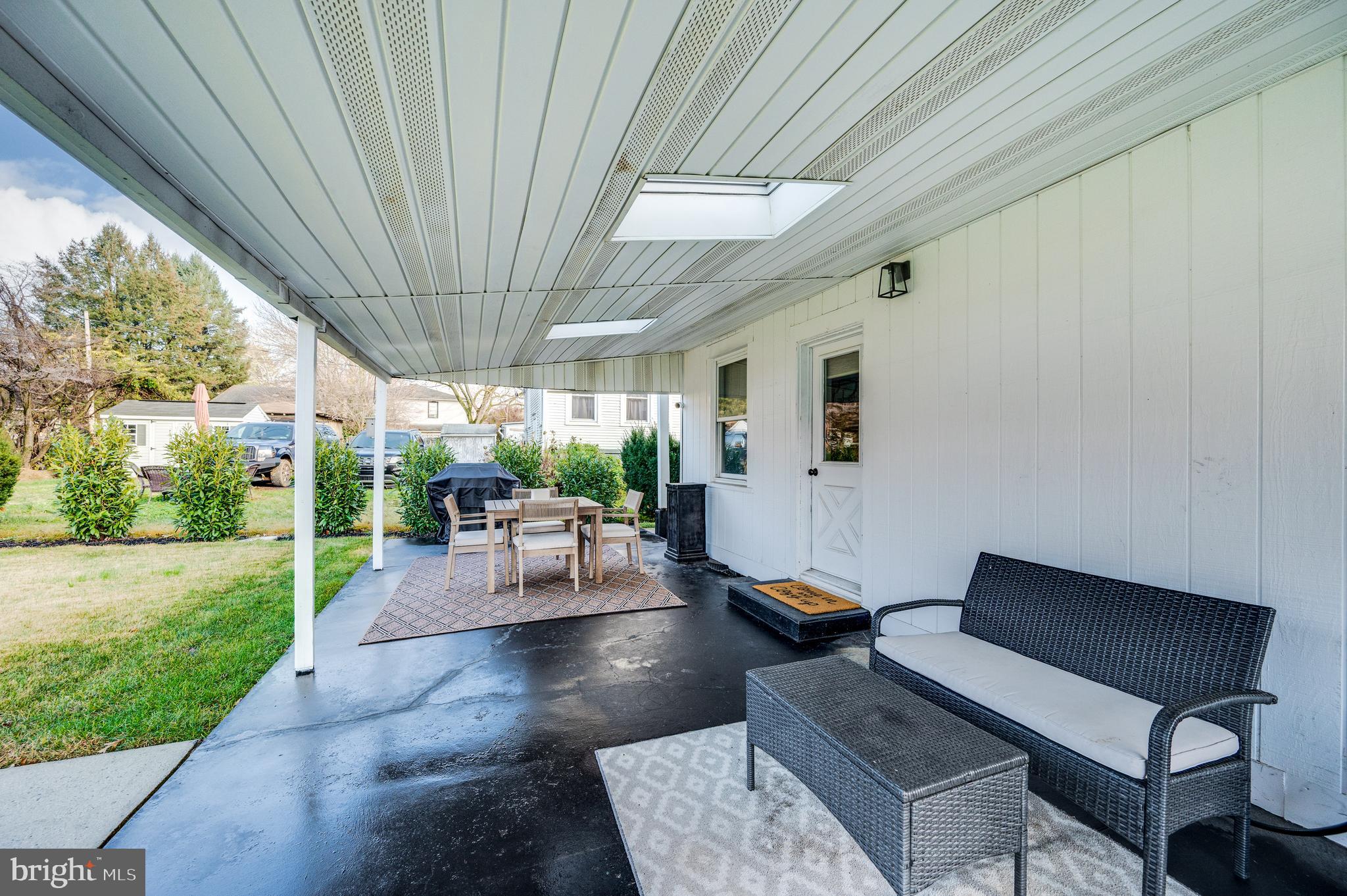 2021 Noble Street Reading, PA 19609 - Photo 50 of 54 a living room with patio furniture and garden view
