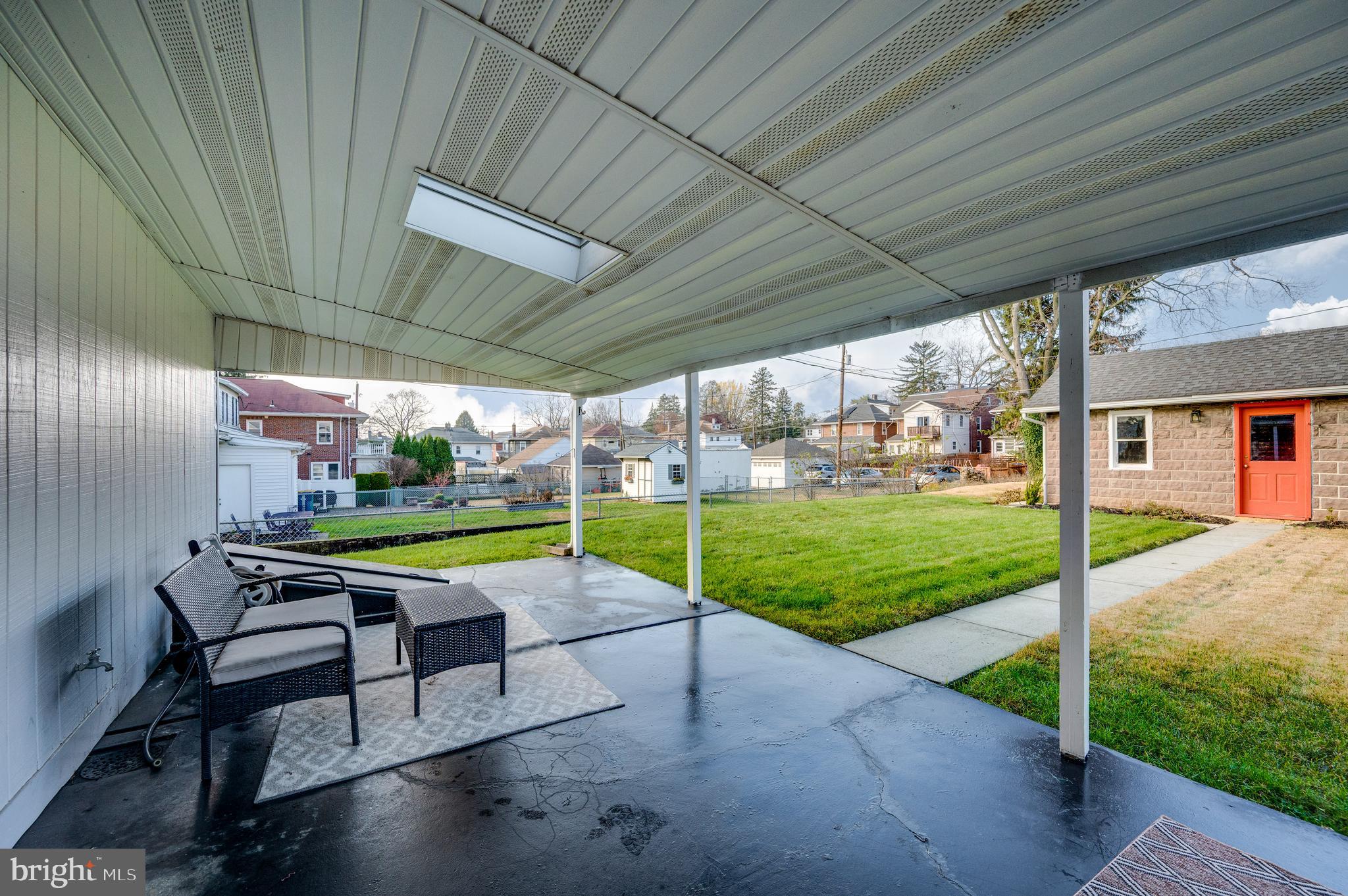 2021 Noble Street Reading, PA 19609 - Photo 52 of 54 a view of a patio with table and chairs under an umbrella