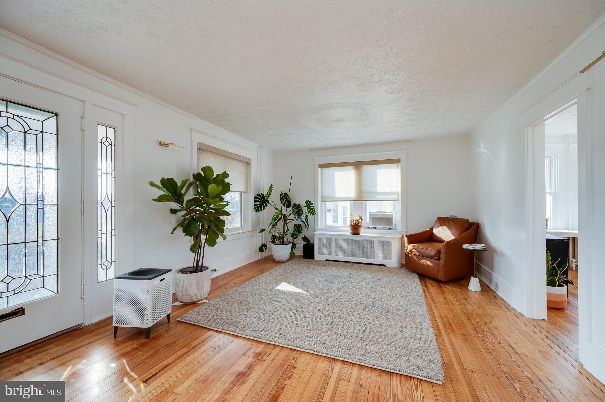 2021 Noble Street Reading, PA 19609 - Photo 10 of 54 a bedroom with furniture and wooden floor