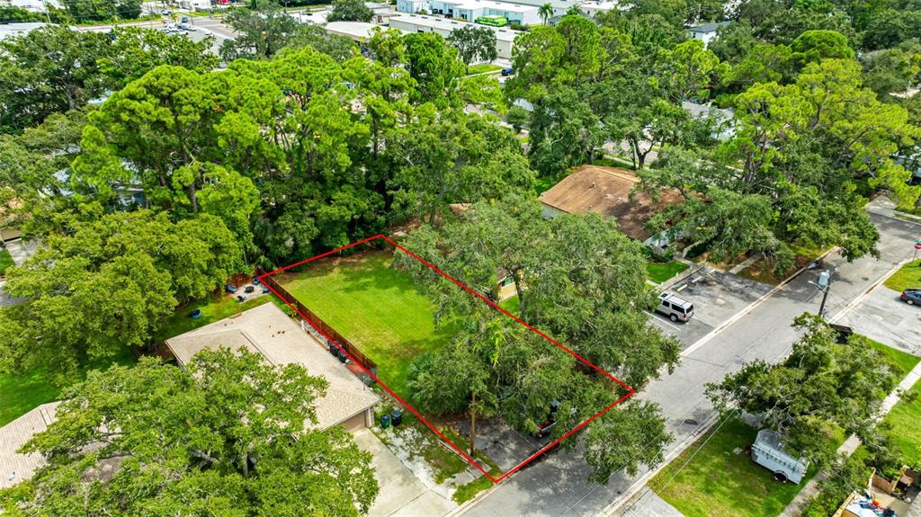 422 Mapleway Safety Harbor, FL 34695 - Photo 2 of 13 an aerial view of a house with a yard and outdoor seating