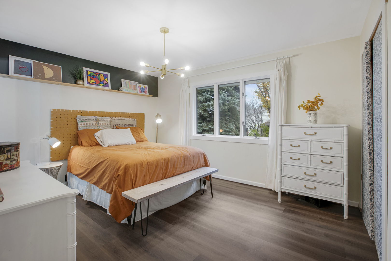 814 Roger Road Woodstock, IL 60098 - Photo 11 of 26 a spacious bedroom with a bed and a window