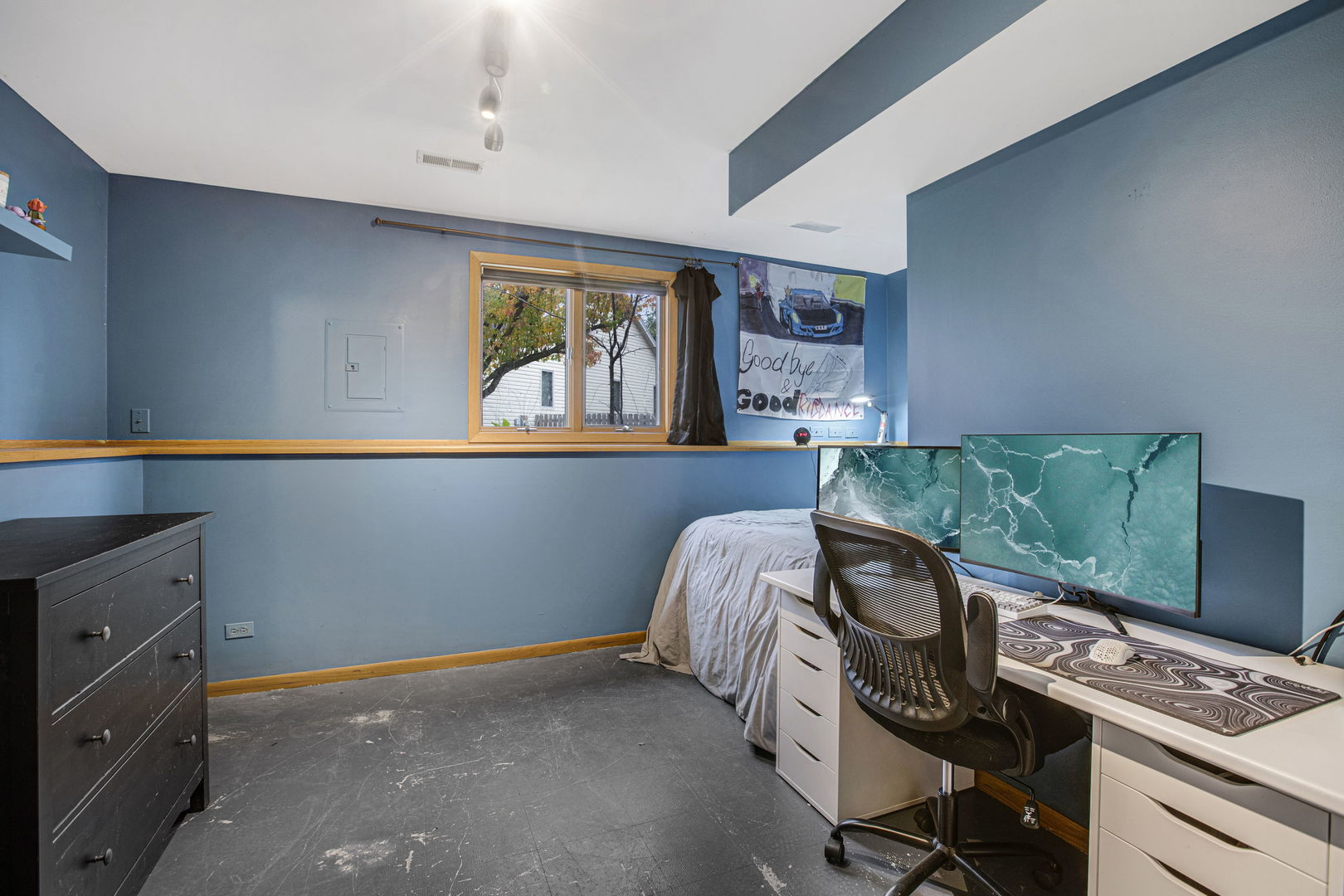 814 Roger Road Woodstock, IL 60098 - Photo 20 of 26 a bedroom with a bed and a window