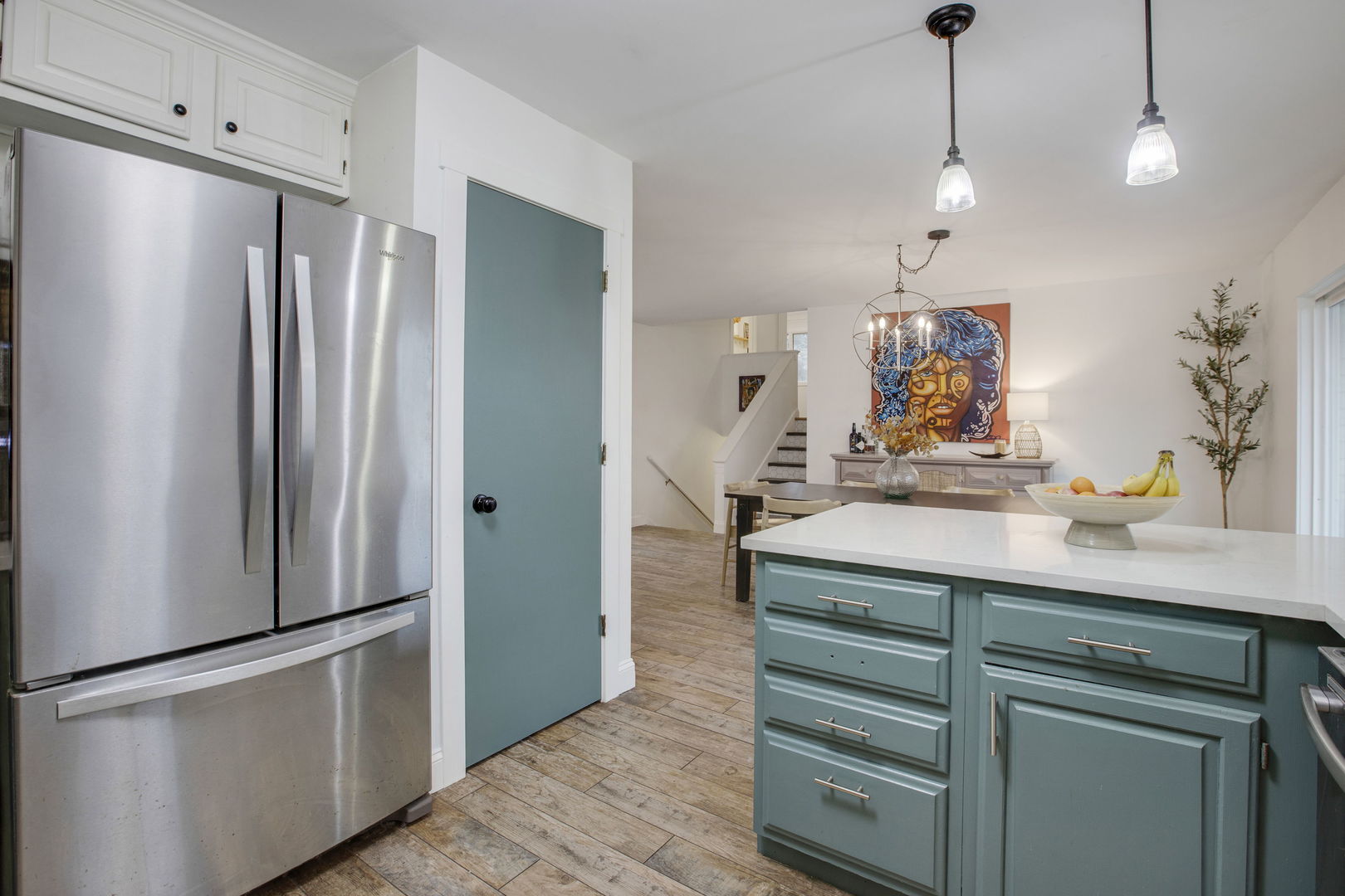 814 Roger Road Woodstock, IL 60098 - Photo 10 of 26 a kitchen with stainless steel appliances a refrigerator and a sink