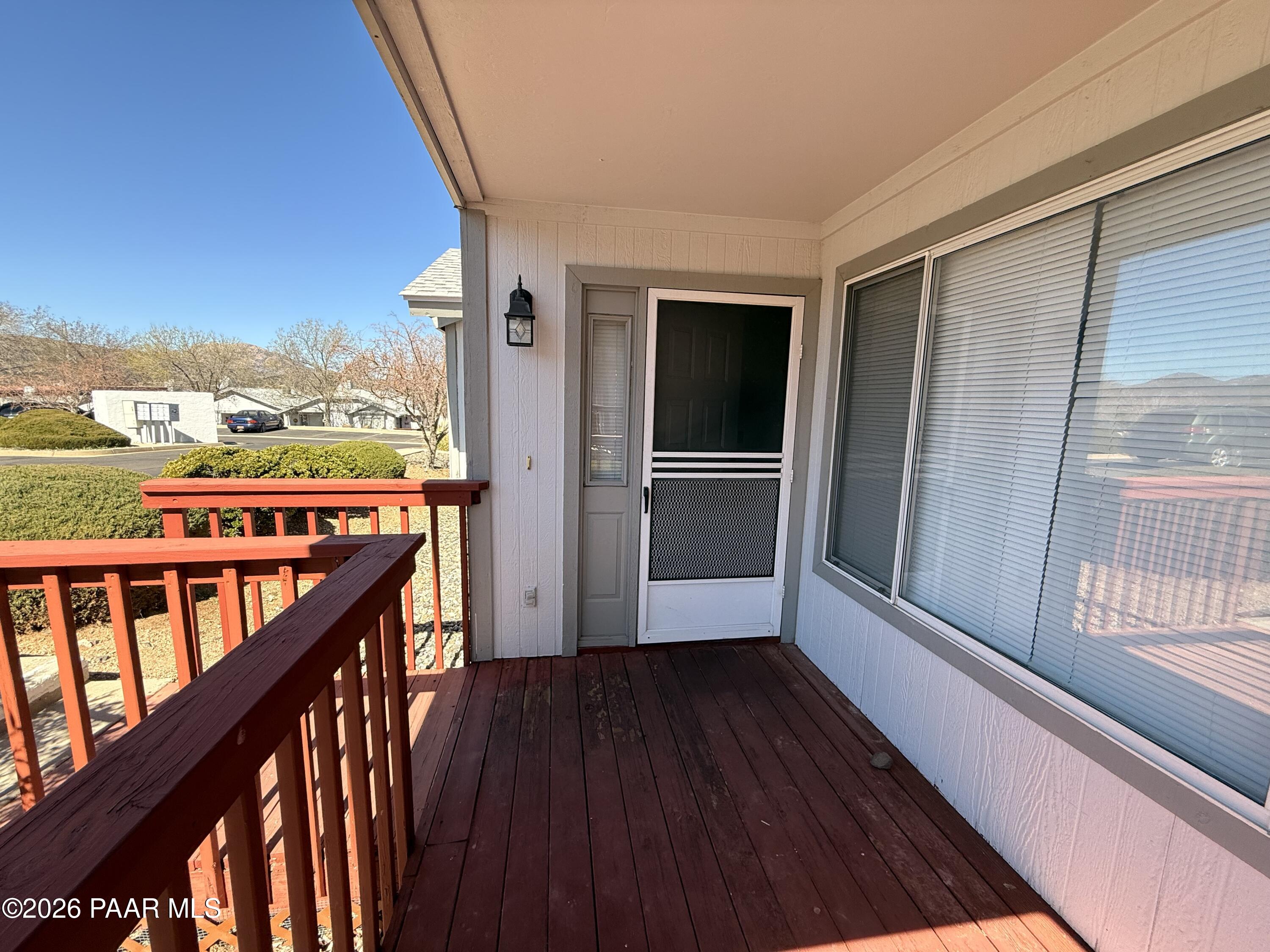 3059 Smokey Road, Unit 21E Prescott, AZ 86301 - Photo 3 of 20 a view of balcony with wooden floor