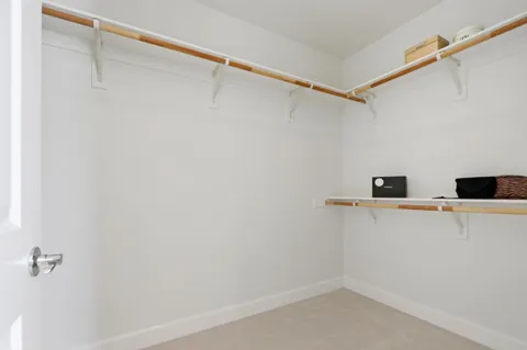 a view of a room with racks on the wall