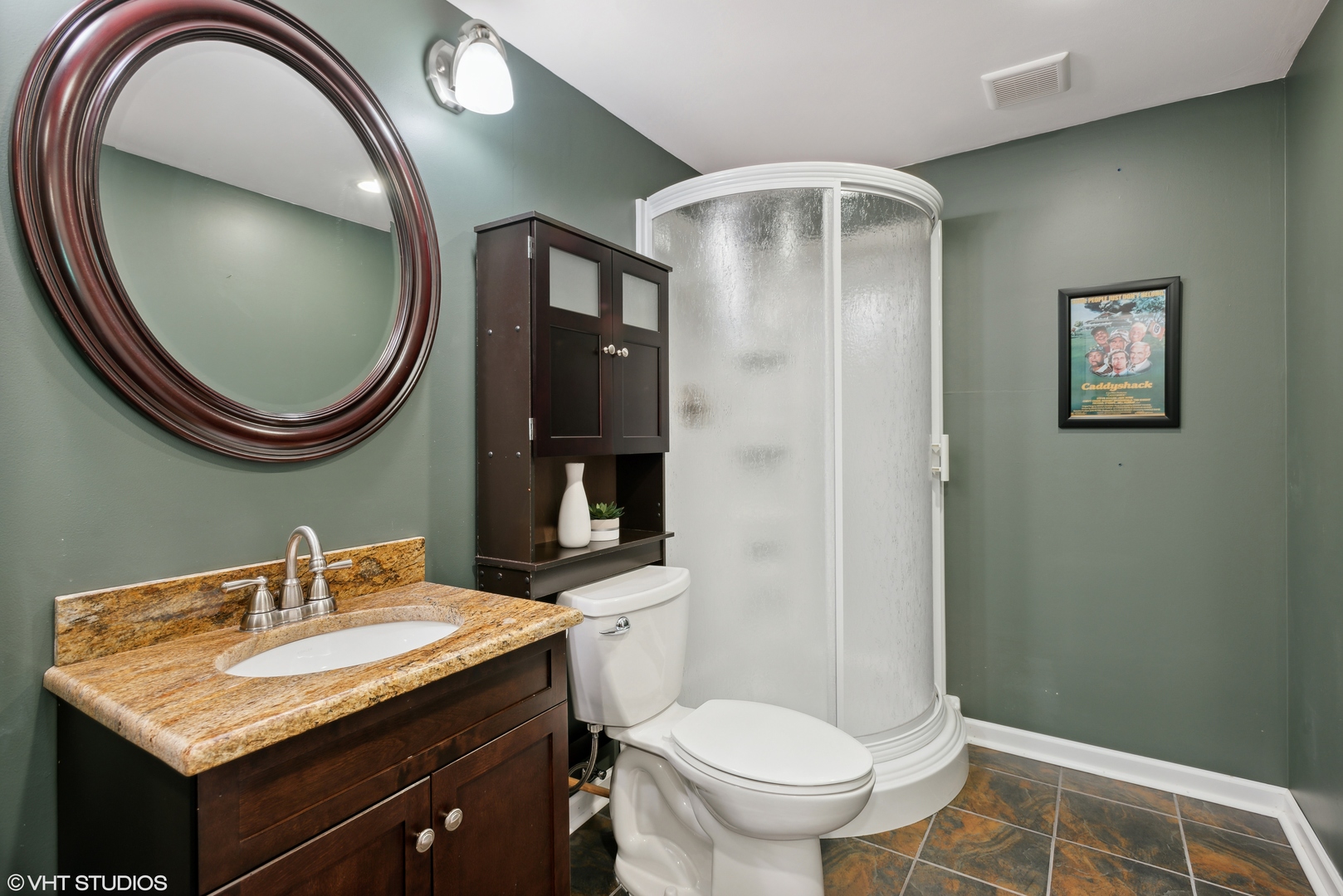3897 Kingsmill Drive Elgin, IL 60124 - Photo 29 of 34 a bathroom with a toilet a sink and mirror