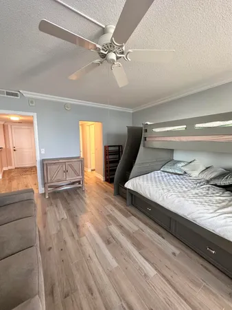 a bathroom with a double vanity sink toilet and shower