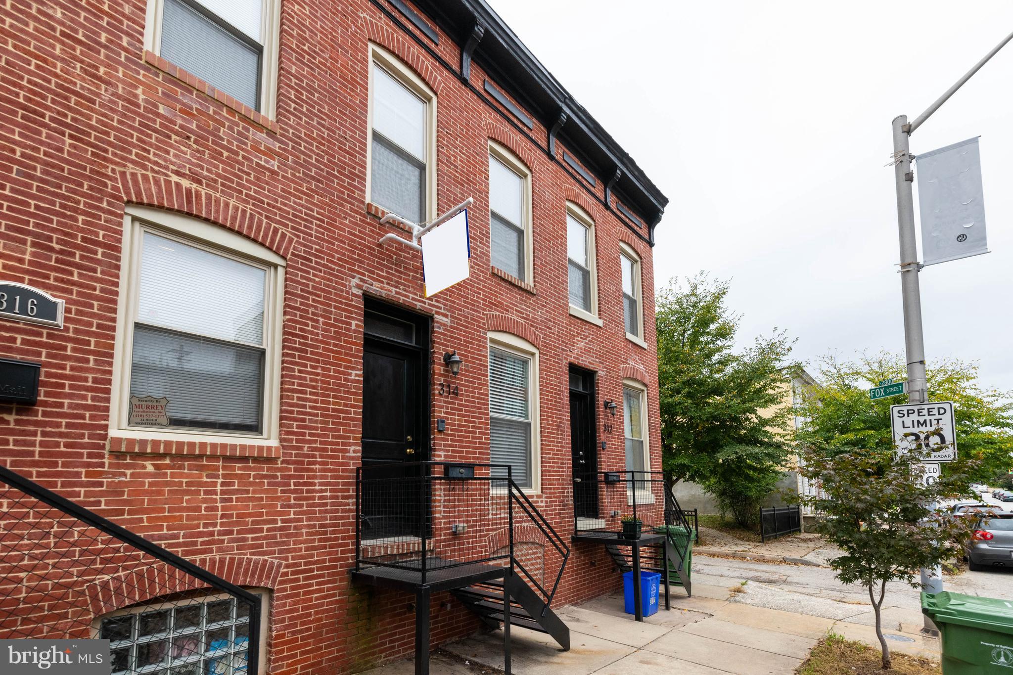 314 West 28th Street Baltimore, MD 21211 - Photo 2 of 27 a view of a building with a window