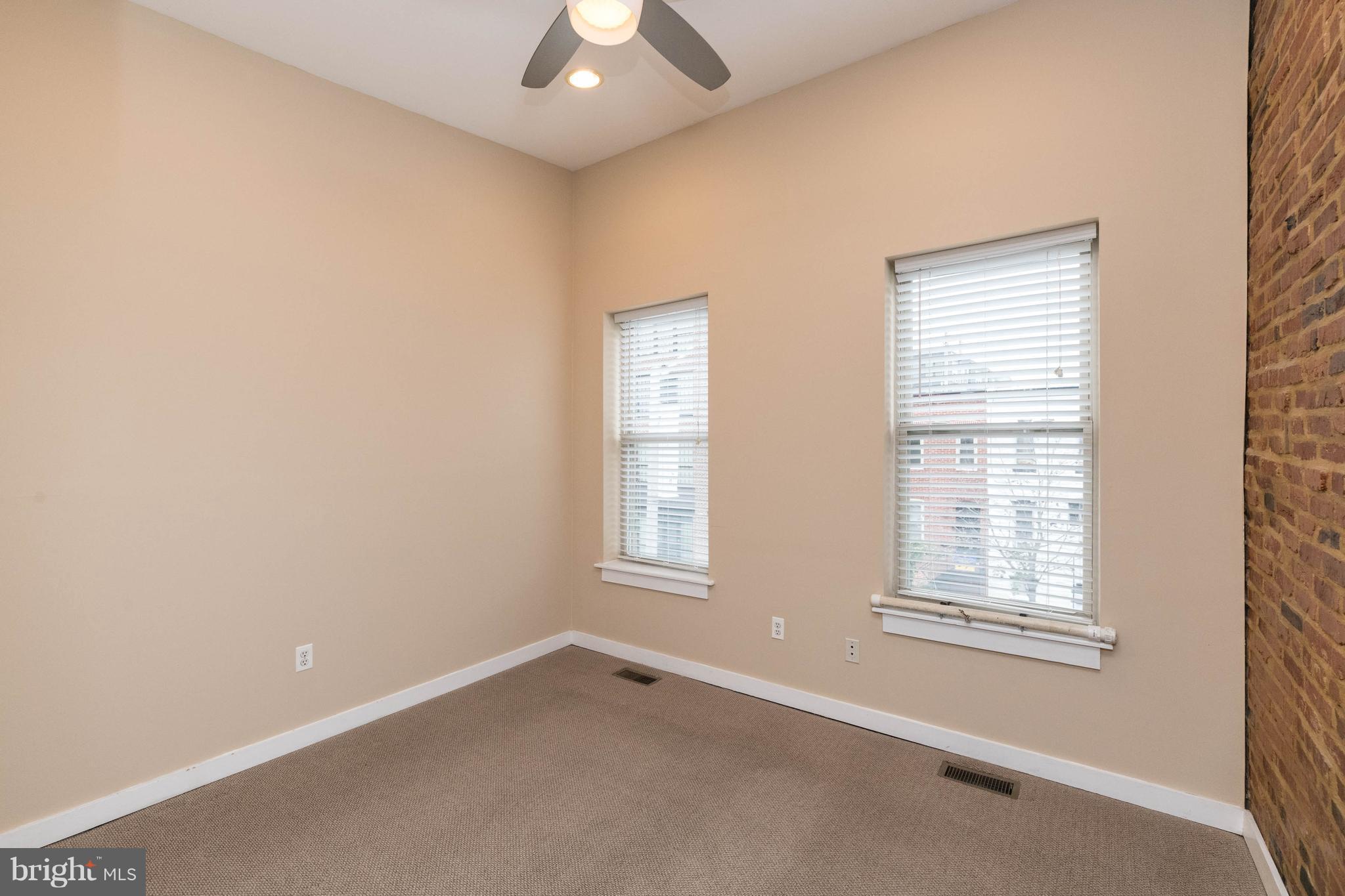 314 West 28th Street Baltimore, MD 21211 - Photo 12 of 27 an empty room with a window
