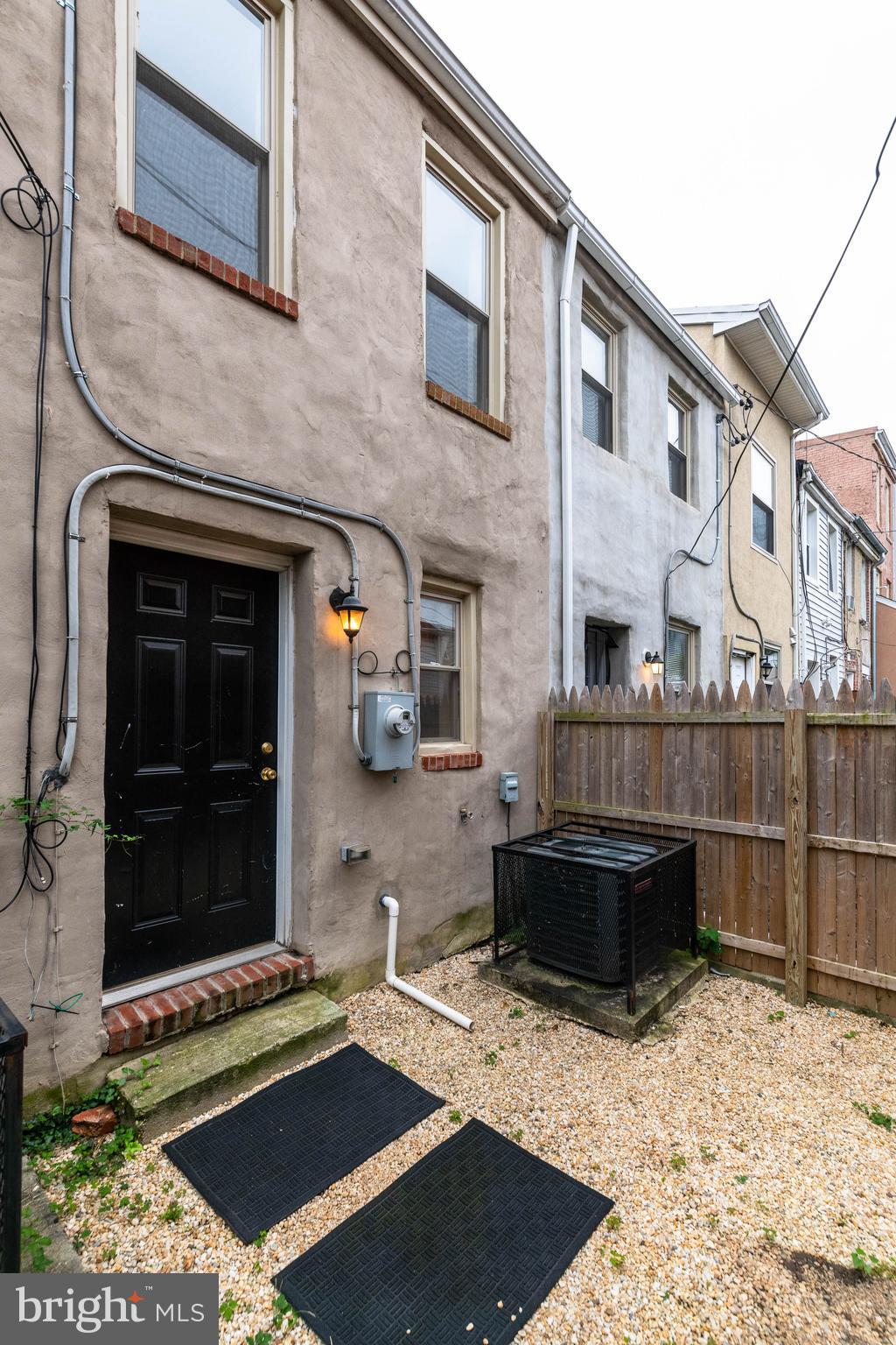 314 West 28th Street Baltimore, MD 21211 - Photo 23 of 27 a front view of a house with parking