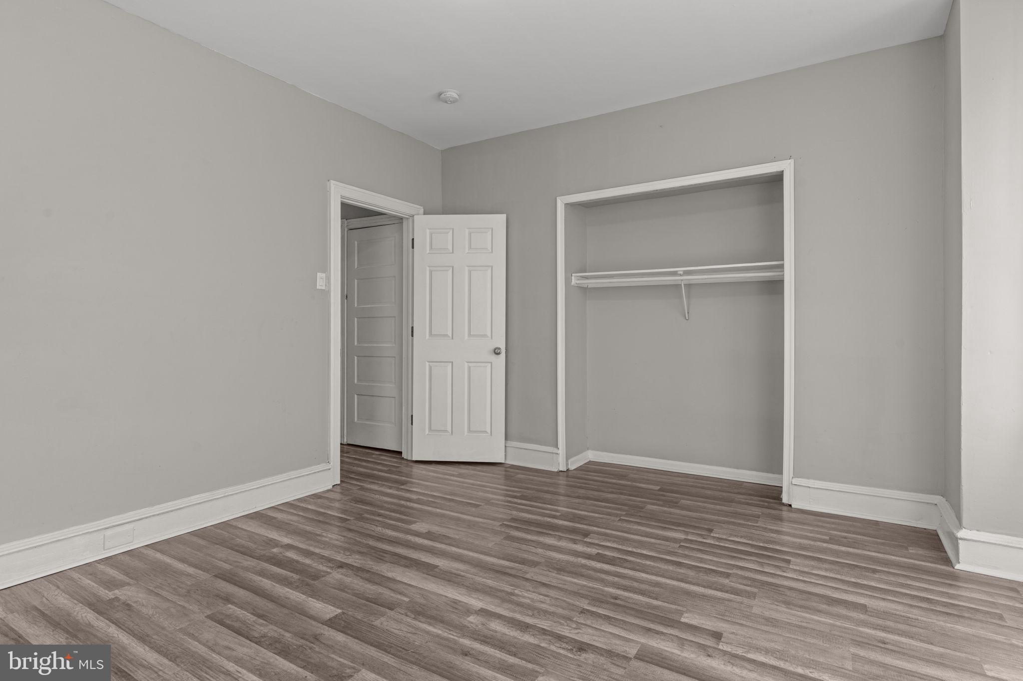 1901 East Venango Street Philadelphia, PA 19134 - Photo 18 of 29 a view of an empty room with wooden floor & closet