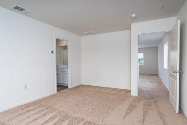 a view of a big room with closet and wooden floor