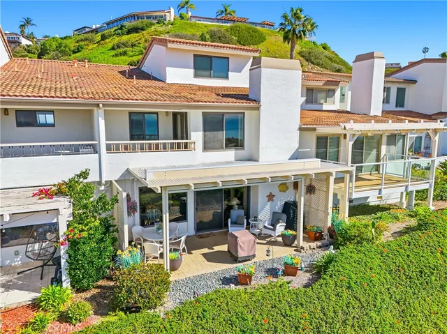 a front view of a house with swimming pool