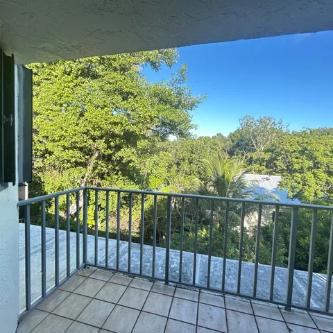 a view of a terrace with sitting area