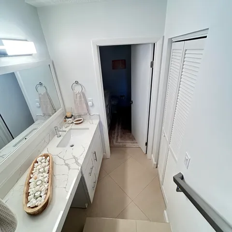 a view of a balcony with chairs