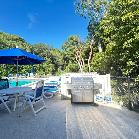 a view of a lake with a yard