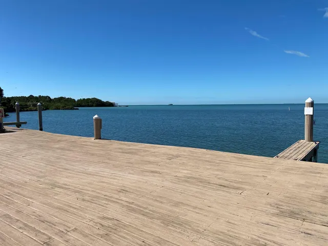 a view of an chairs and tables in the patio
