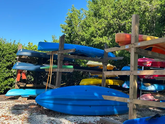 a view of a backyard with sitting area
