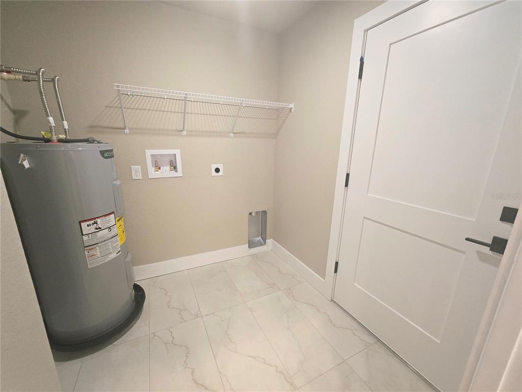 8541 Northeast 105th Avenue Bronson, FL 32621 - Photo 15 of 20 a view of utility room