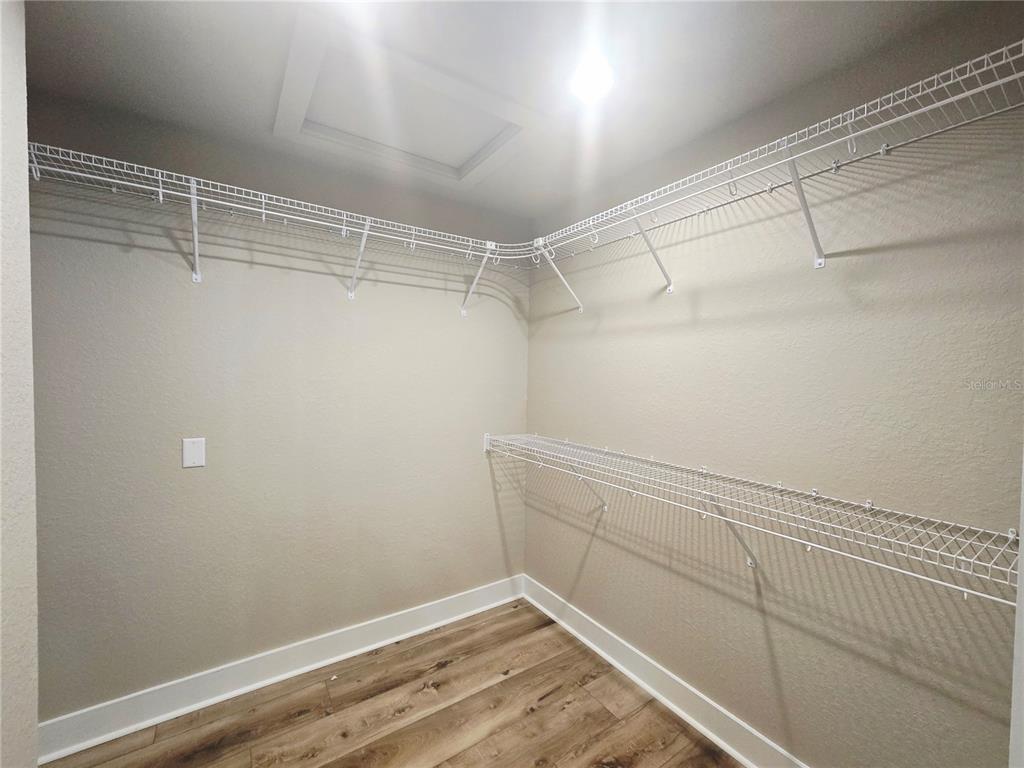 8541 Northeast 105th Avenue Bronson, FL 32621 - Photo 20 of 20 a view of a room with racks on the wall