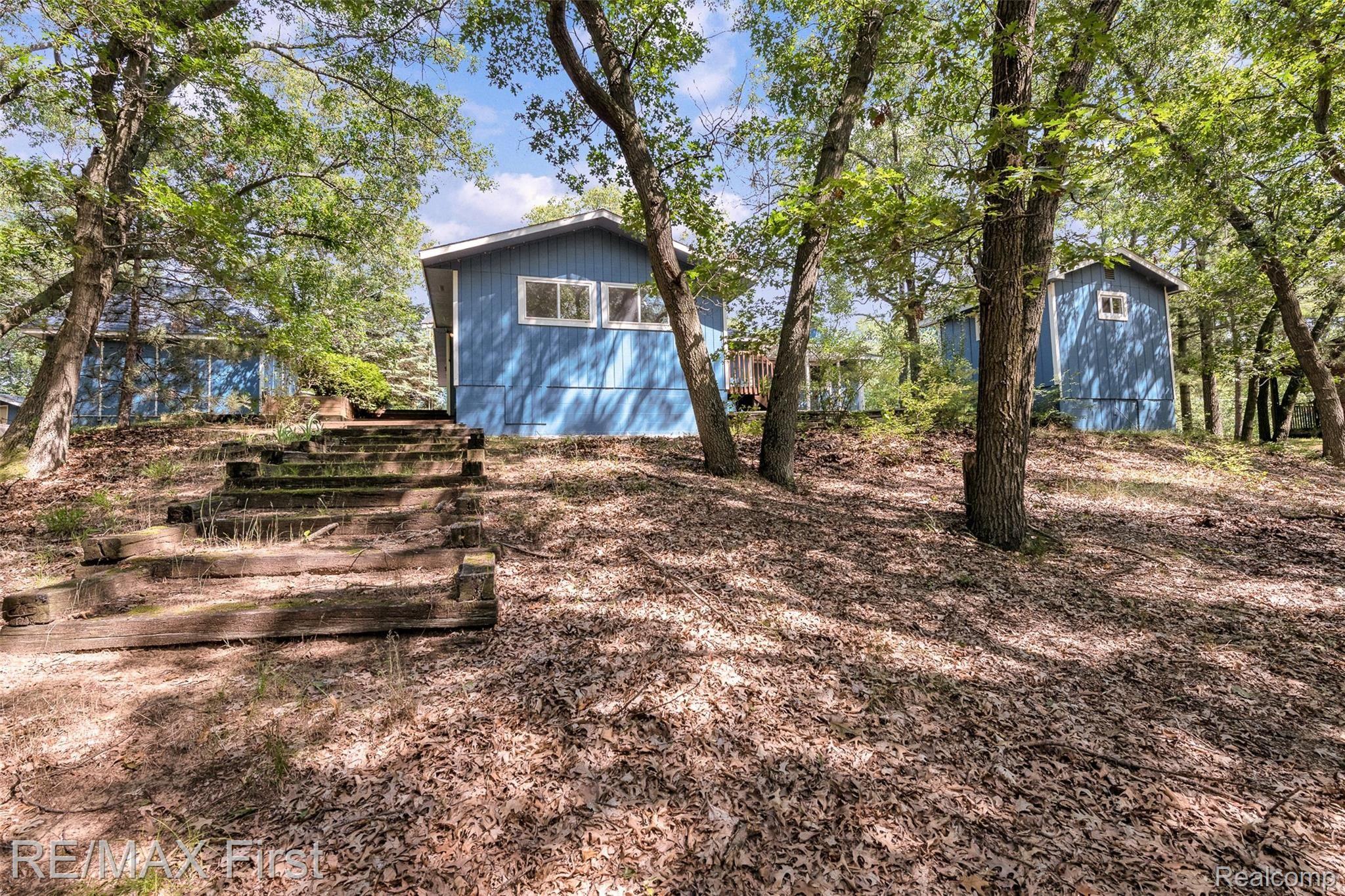 4521 Port Austin Road Caseville, MI 48725 - Photo 29 of 35 Left to Right: Gazebo, 4BR, Cabana