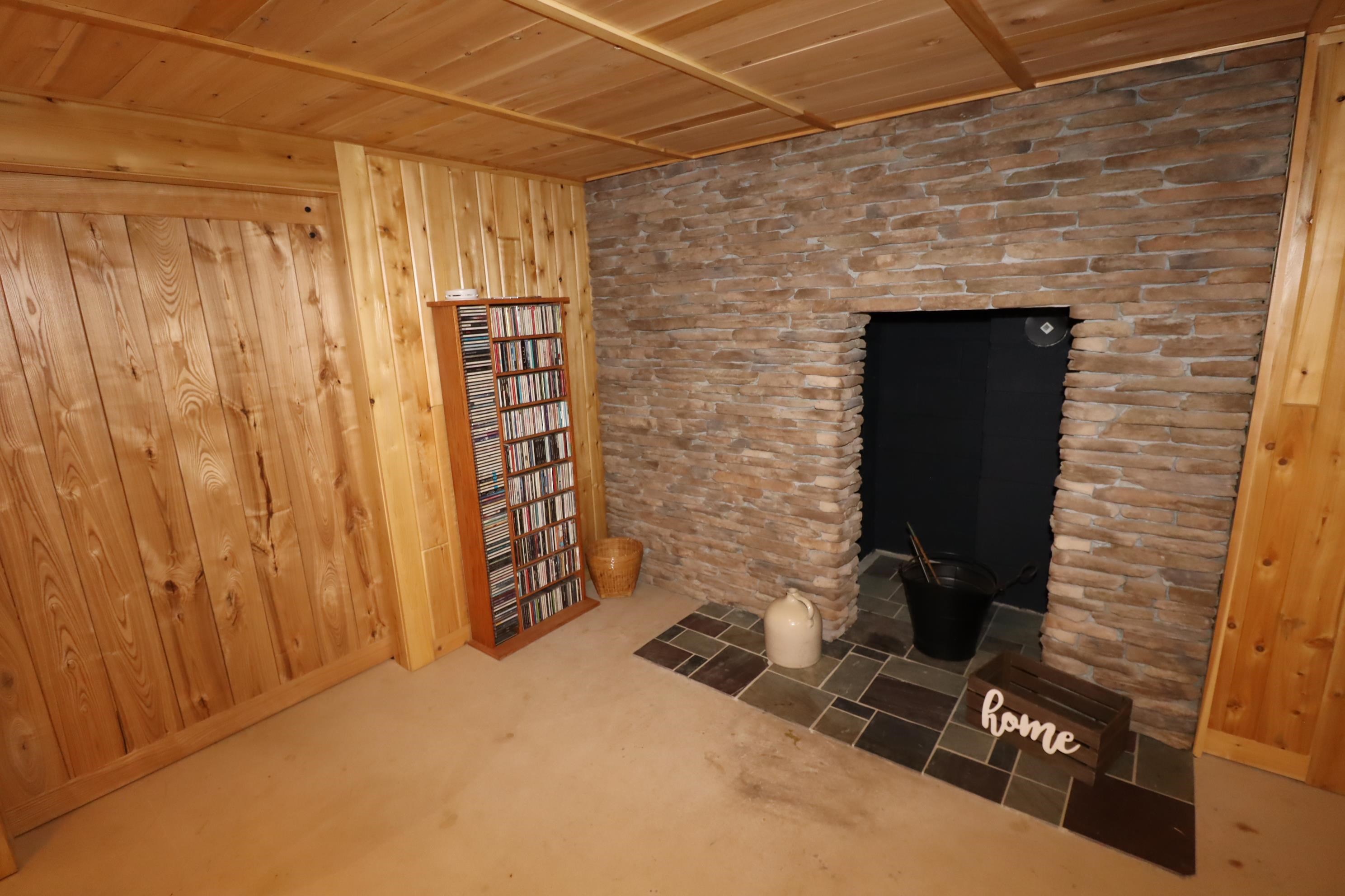 15760 Wagner Vogt Road Butternut, WI 54514 - Photo 21 of 33 Lower Level Fireplace