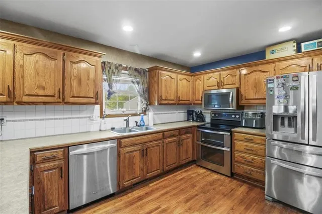 $549,000 | 20509 South Bogar Circle, Belton, MO 64012