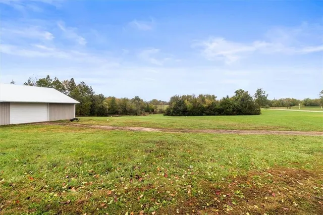 $549,000 | 20509 South Bogar Circle, Belton, MO 64012