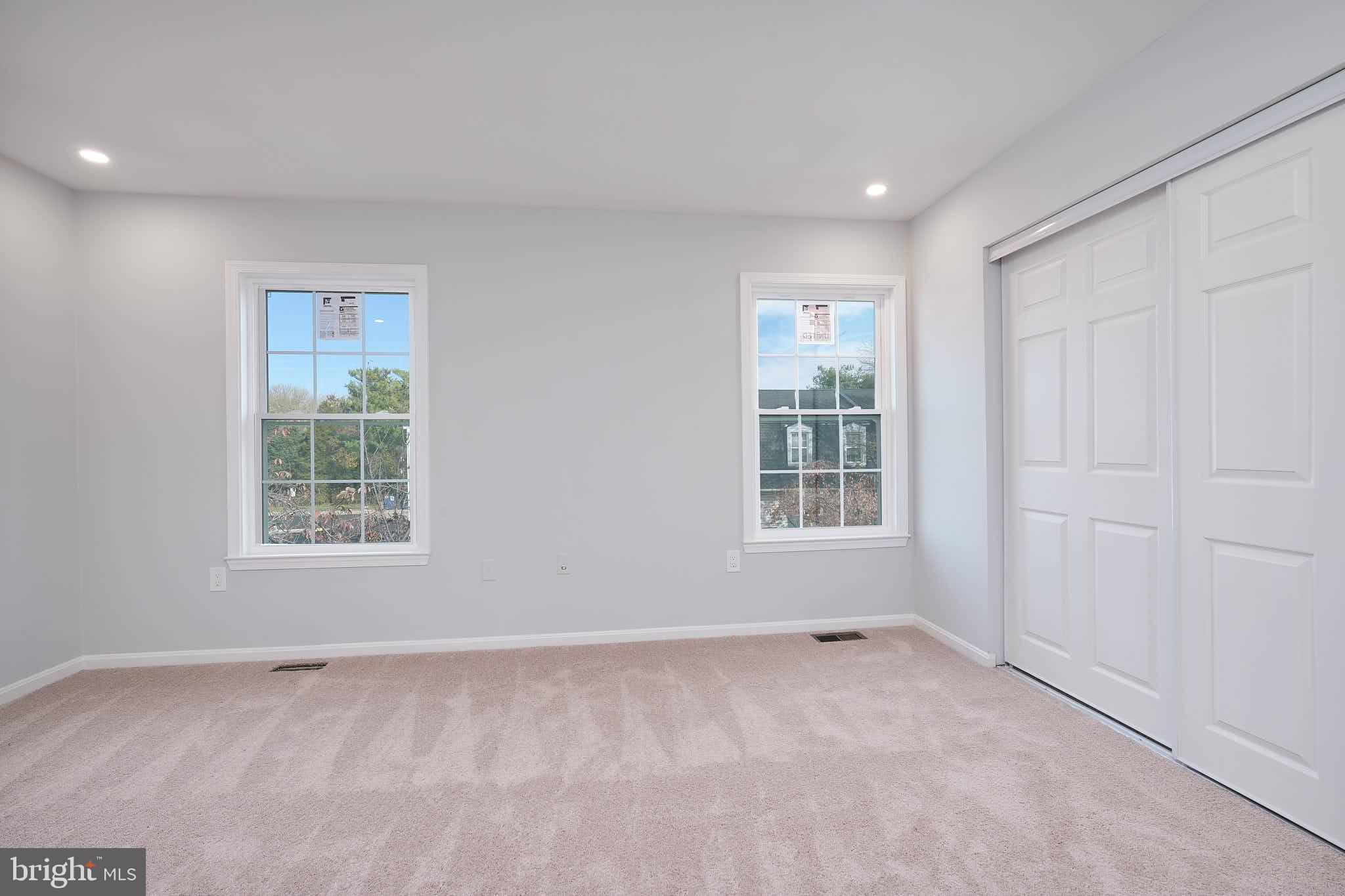 7938 Brighton Way Manassas, VA 20109 - Photo 16 of 26 a view of an empty room with a window