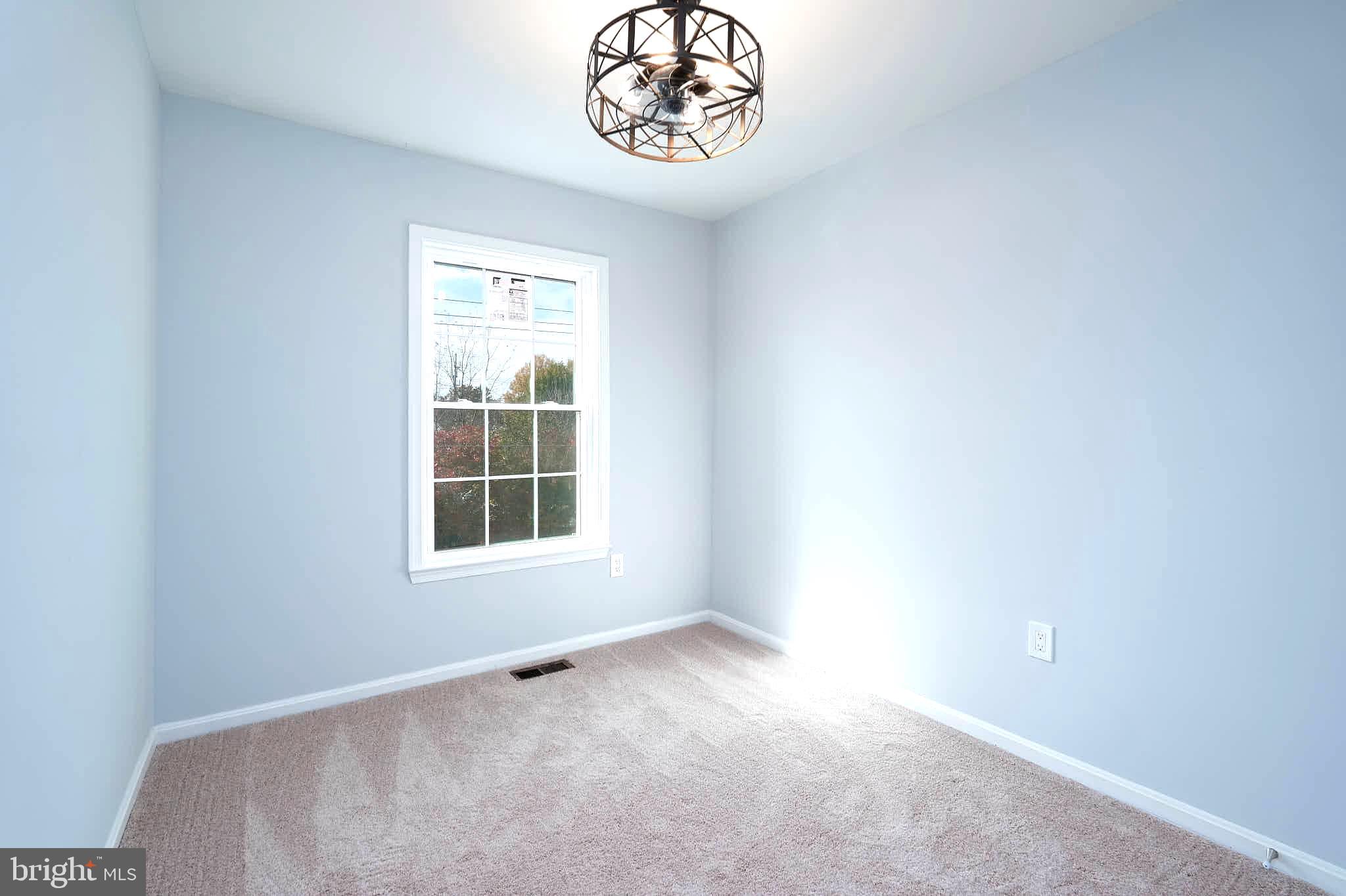 7938 Brighton Way Manassas, VA 20109 - Photo 21 of 26 a view of an empty room with a window