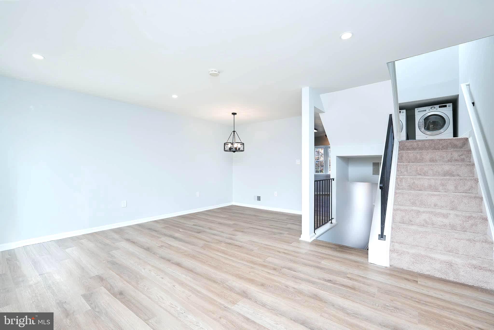 7938 Brighton Way Manassas, VA 20109 - Photo 7 of 26 a view of a livingroom with wooden floor