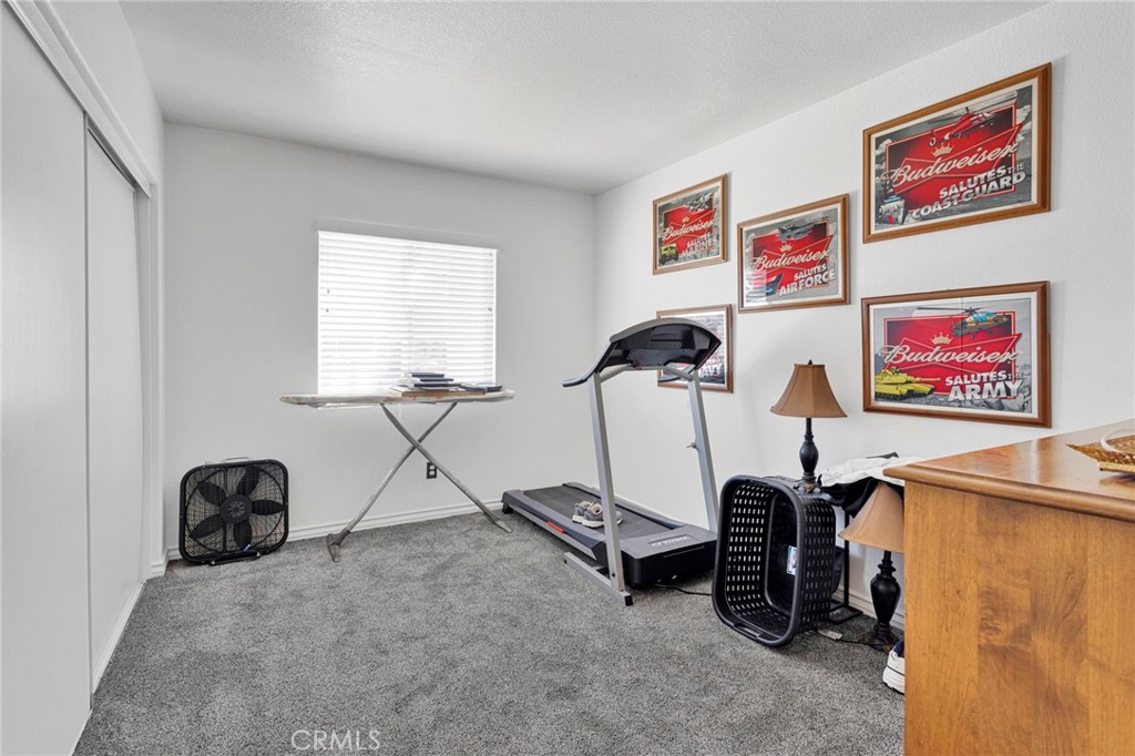 13863 Coachella Road Apple Valley, CA 92307 - Photo 32 of 53 a view of a room with gym equipment