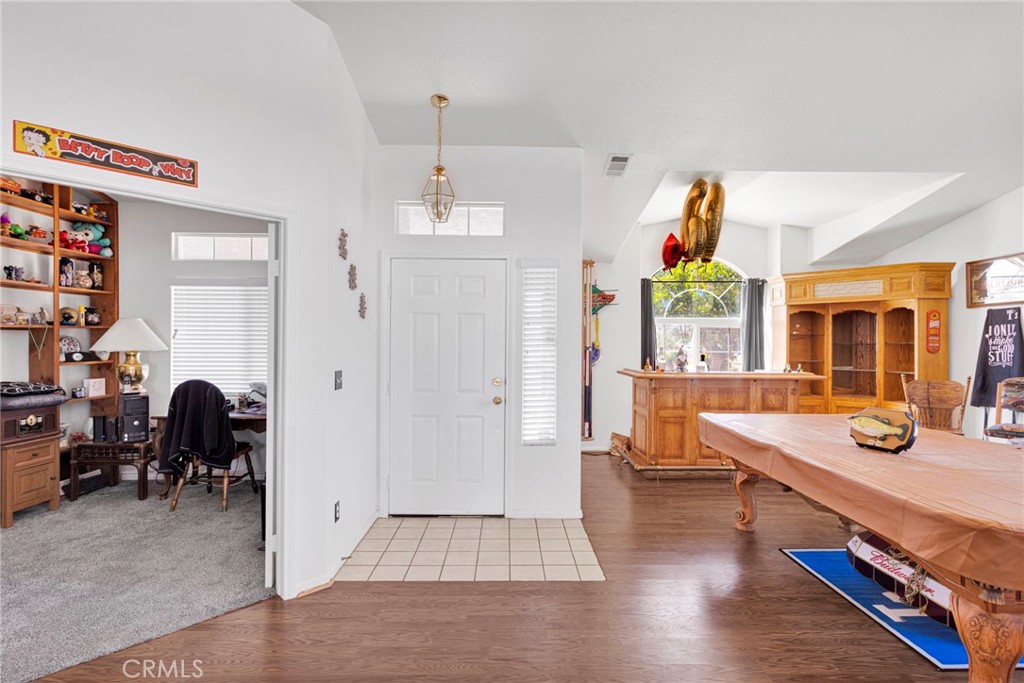 13863 Coachella Road Apple Valley, CA 92307 - Photo 8 of 53 a view of a living room and dining room