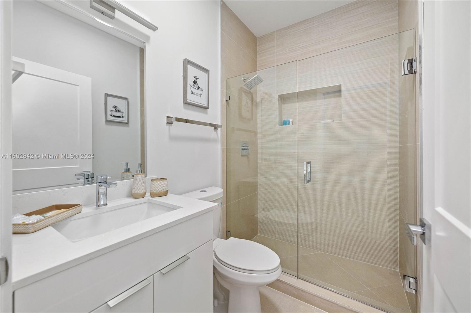 Allapattah Miami, FL 33142 - Photo 21 of 27 a bathroom with a sink toilet and shower