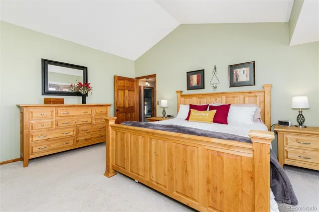 a room with pool table and windows