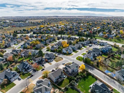 an aerial view of a city with lots of residential buildings