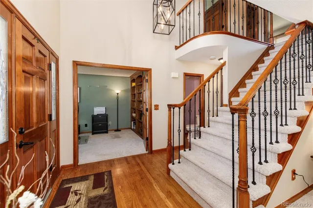 a living room with furniture or stairs and a couch