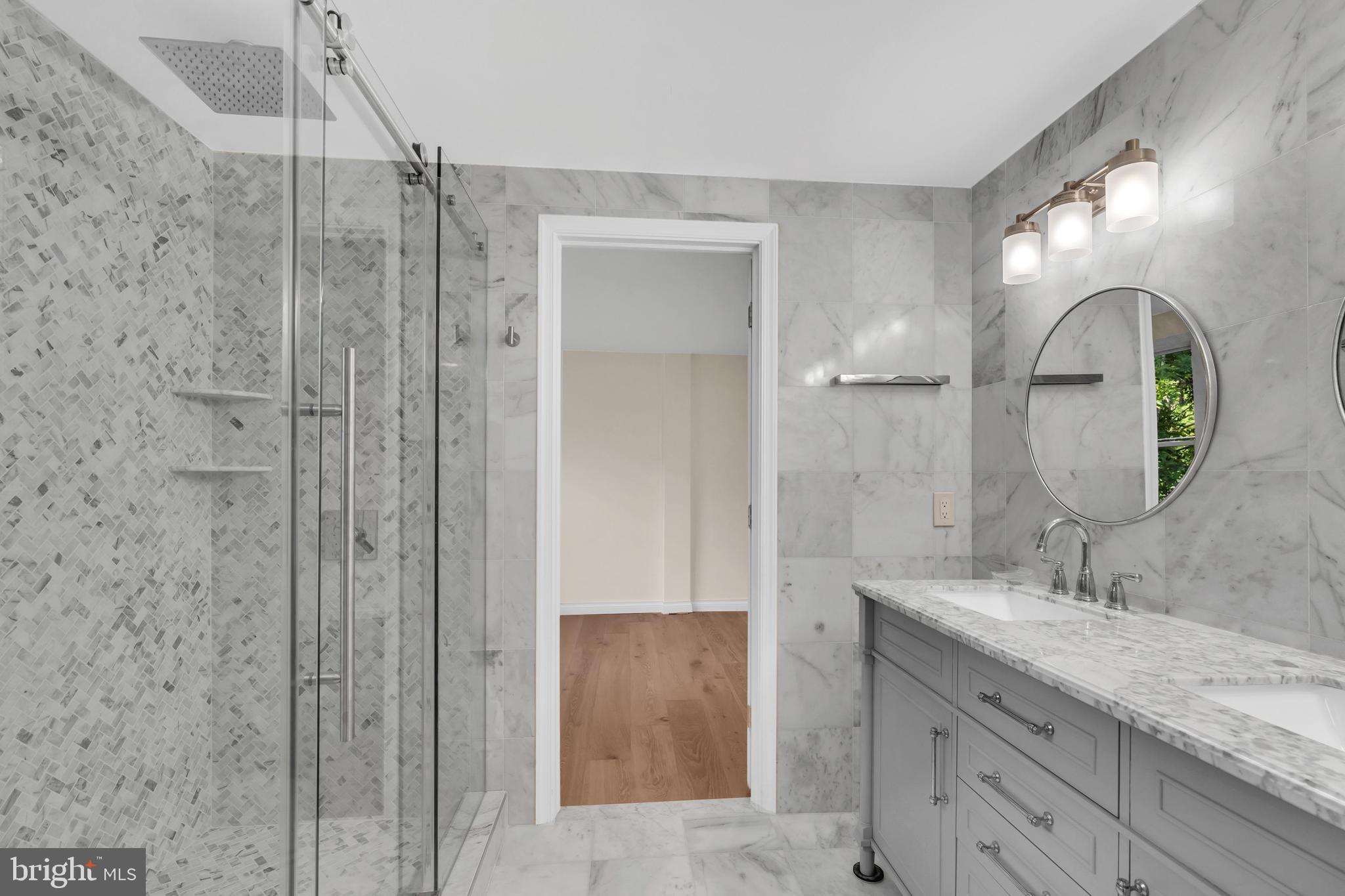 2296 Archdale Road Reston, VA 20191 - Photo 42 of 55 Floor to wall marble in bathroom