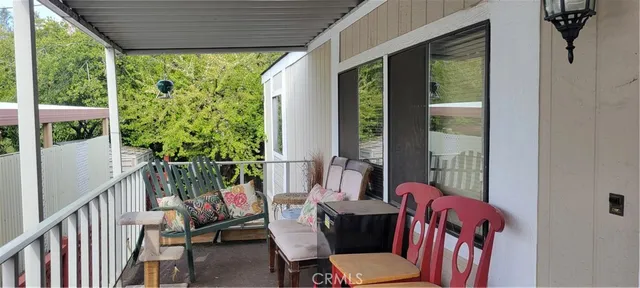 a balcony with chairs