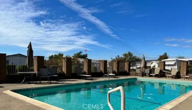 a view of a fountain in front of a house