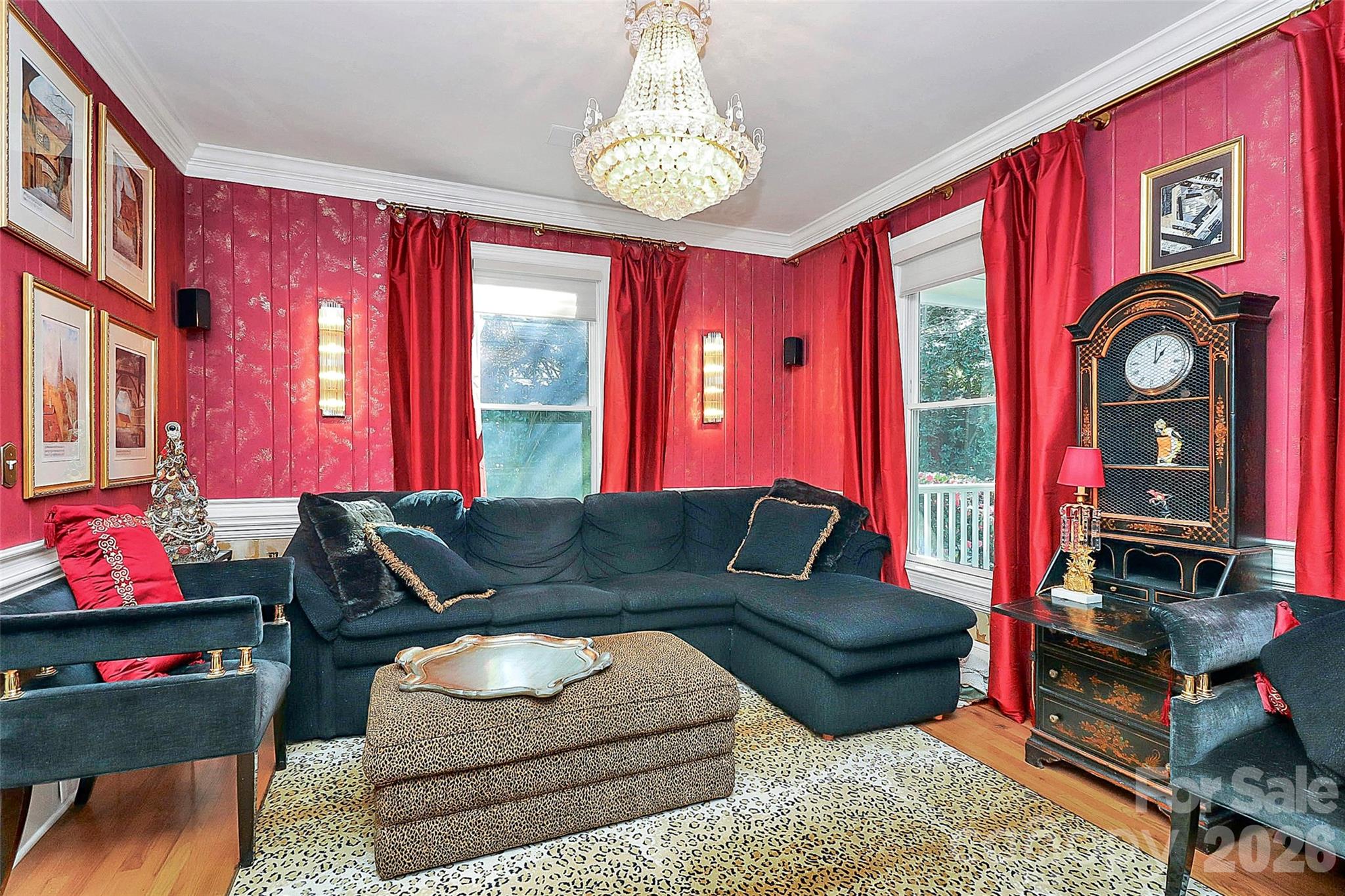 304 South Canterbury Road Charlotte, NC 28211 - Photo 11 of 39 a living room with furniture a flat screen tv and a window