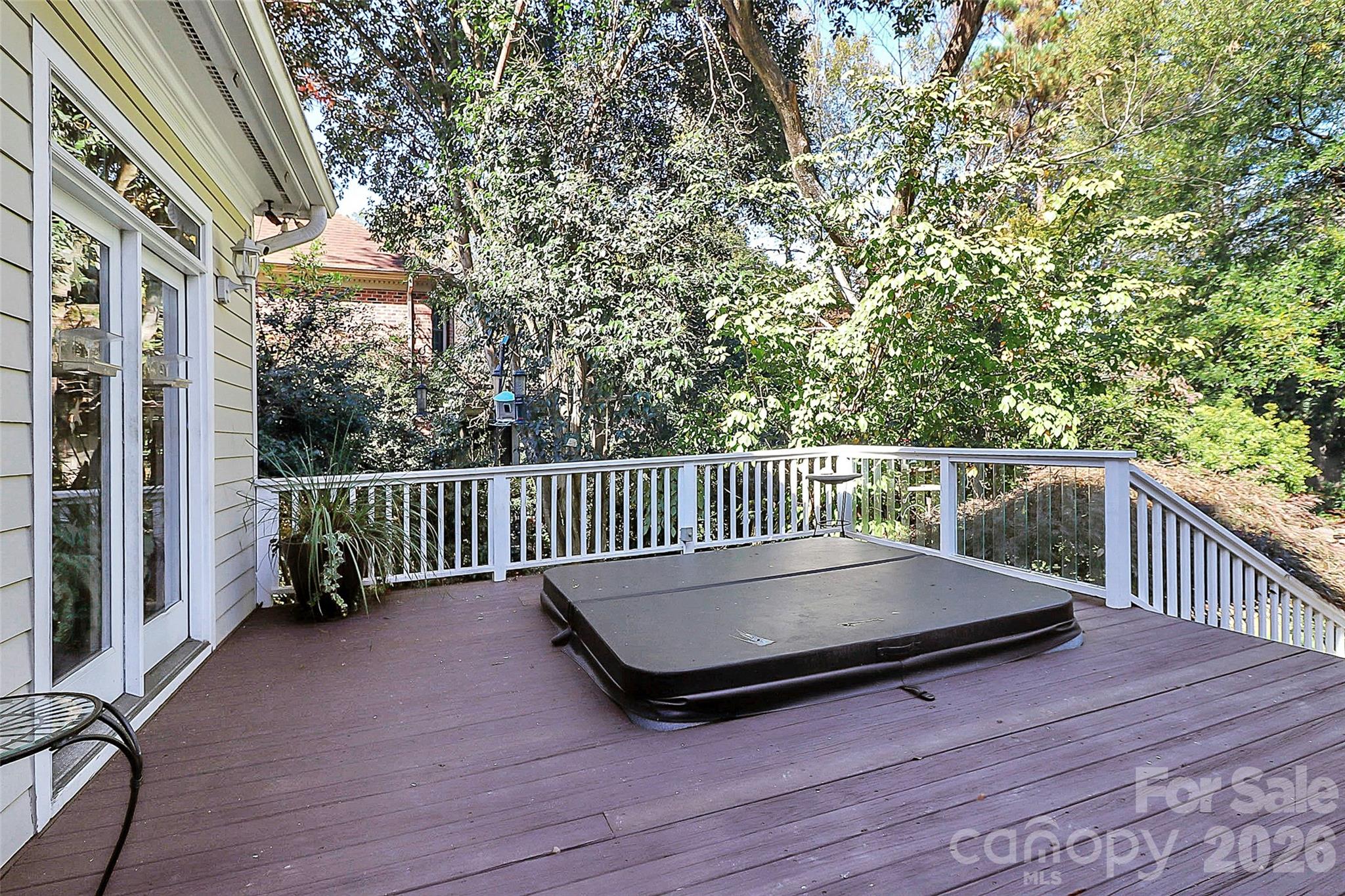 304 South Canterbury Road Charlotte, NC 28211 - Photo 38 of 39 a balcony with trees in front of it